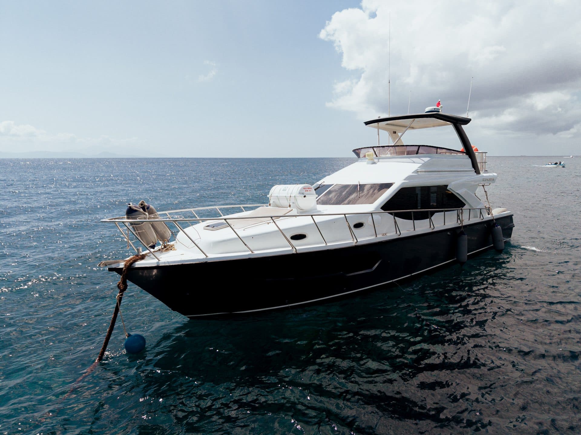 Azure Dream luxury yacht side profile on deep blue water in Bali