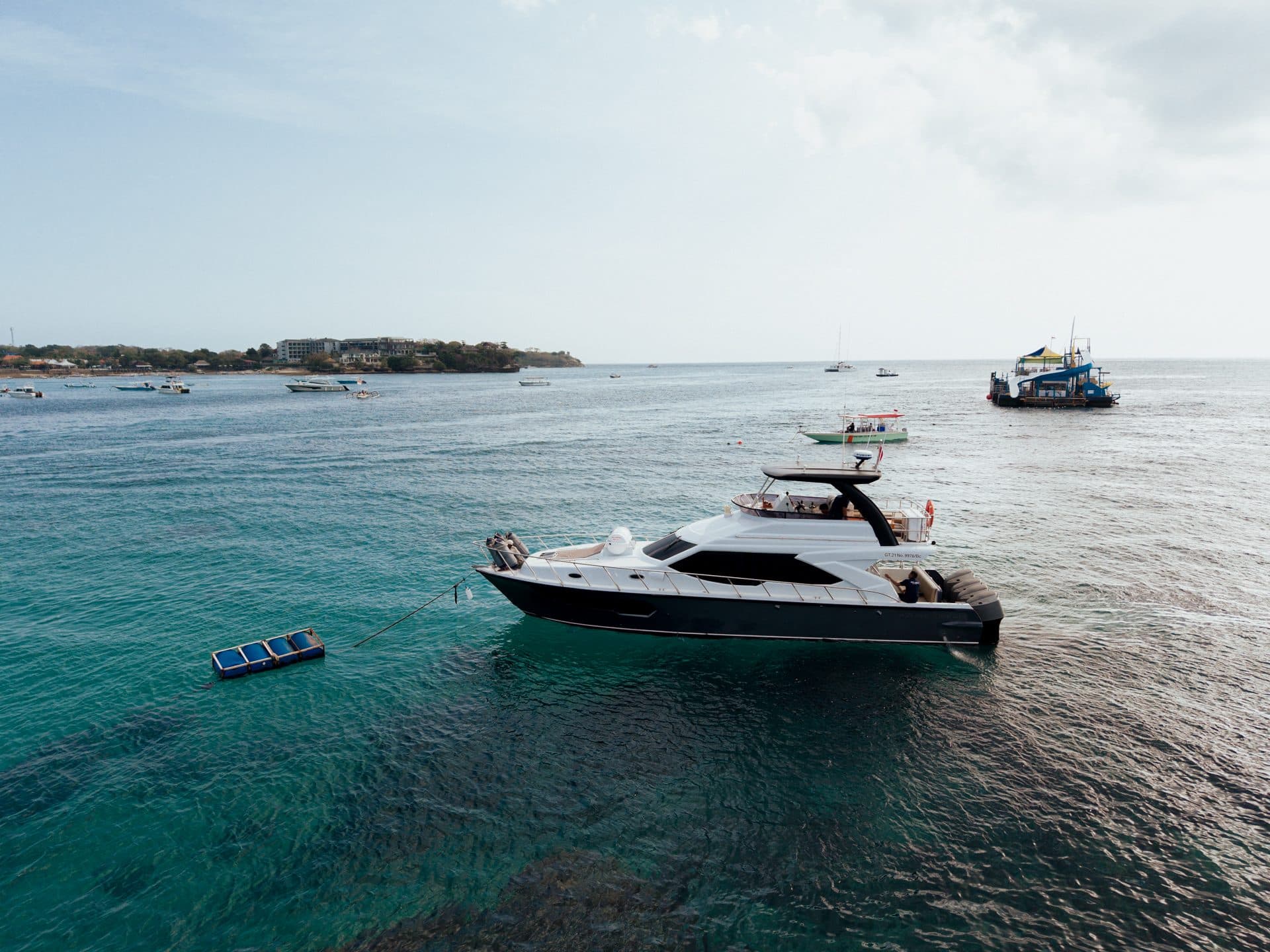 Azure Dream anchored near a Bali island, aerial view