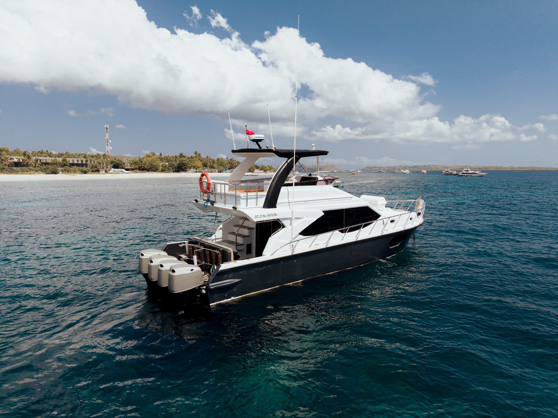 Azure Dream yacht off a white-sand beach in Bali